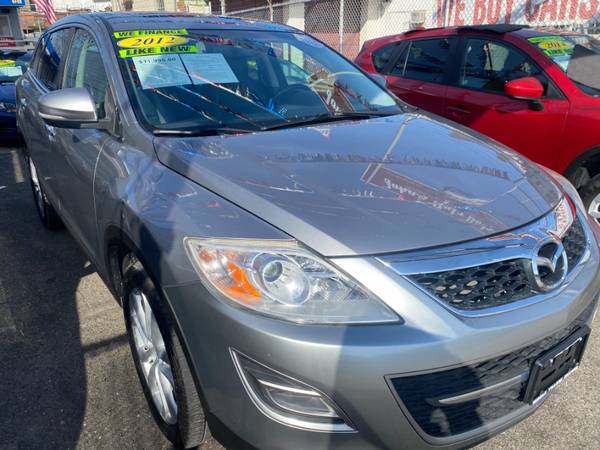 Un impresionante Mazda CX-9 2012 con 96.830 millas - queens - $10.995 (Middle Village)63654715400705120