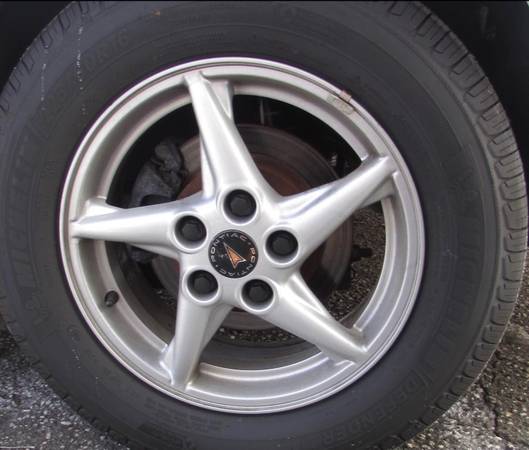 Set of four 16 inch, 1999 Pontiac Grand Prix GT wheels, in ex. Cond. 1