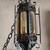 Caged glass midievil wrought iron swag light amber 2 thumbnail