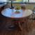 Round Oak Table, with extension leaf and 4 oak chairs 1 thumbnail