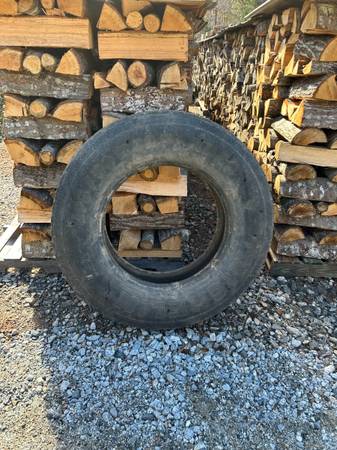 Workout Tire with holes drilled to minimize water collection 1