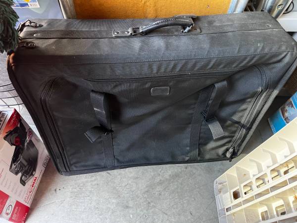 Tumi Suitcase 4 Wheels, Pull Strap, Secure Straps 30x10x22 1
