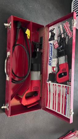 Milwaukee Sawzall Plus with metal case 1