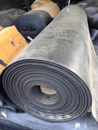 3- New rolls of rubber roofing 1