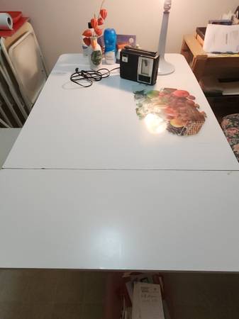 Ikea 7x white metal foldable chairs plus ikea table 1