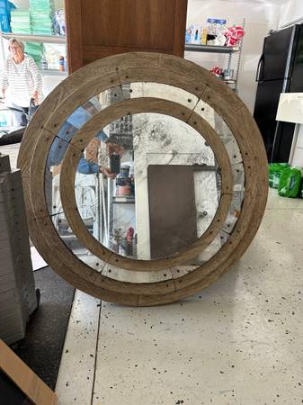 Large round mirror from either Bliss home store or juxtaposition 1