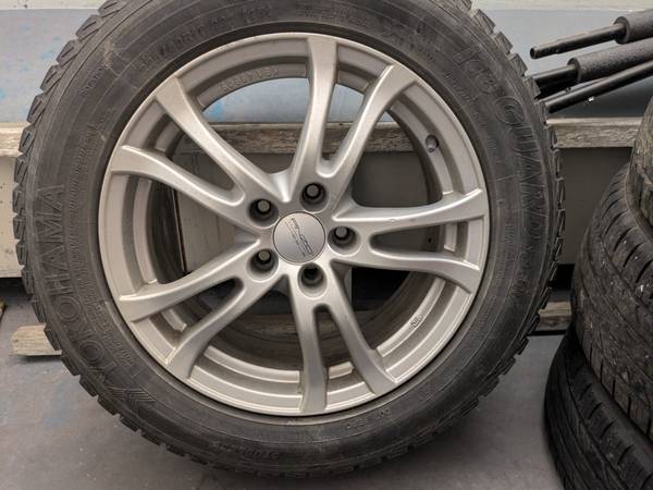5 x 4.5 wheels and snow tires 1