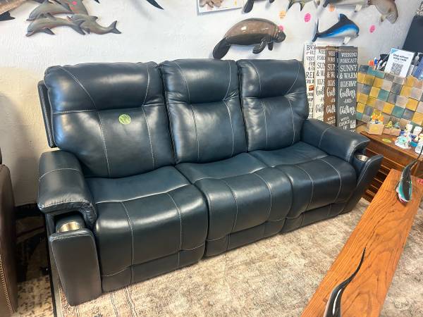 Like new leather electric dual reclining couch with electric headrests and elect 1