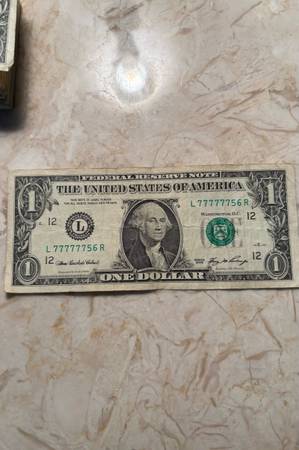 One dollar (serial #) 1