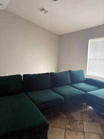 Emerald green elegant fabric sectional with ottoman 1 year old 1
