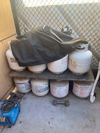 Many Empty Propane Tanks BBQ Barbecue Grill Asador 1