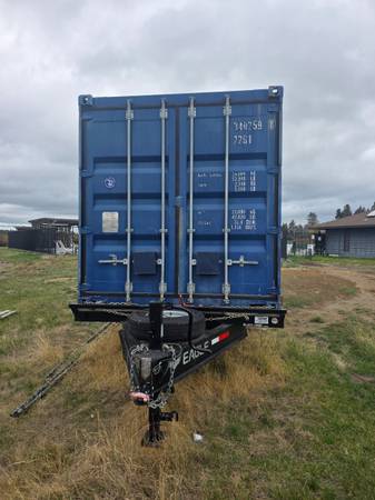 20' deck over flatbed with conex box 1