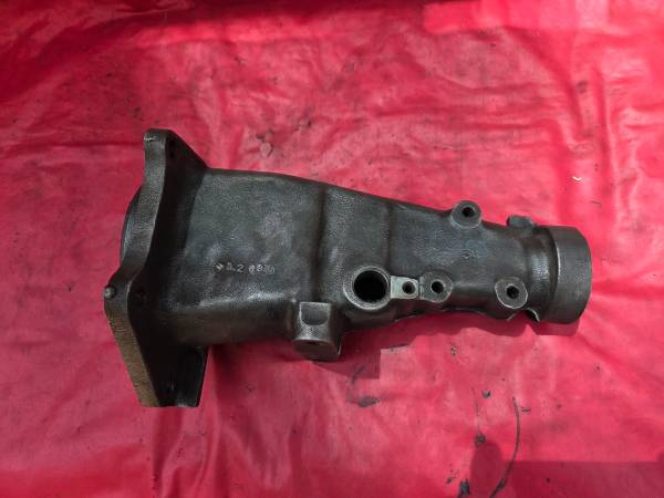 1969 camaro Saginaw 4 speed tail housing with bolt holes for shifter 1