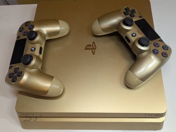 Gold PS4 with two controllers 1
