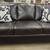 Sleek dark brown leather sofa** DELIVERY AVAILABLE 1 thumbnail