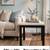 Crate and Barrel side table travertine top, black metal base 1 thumbnail
