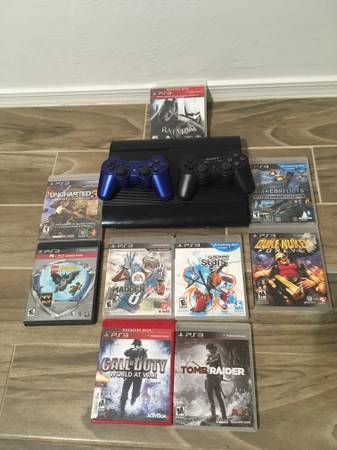 LOWERED: PS3 with 2 Controllers and games 1
