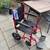 Lightweight Expedition Transport Wheelchair with Hand Brakes, Red 1 thumbnail