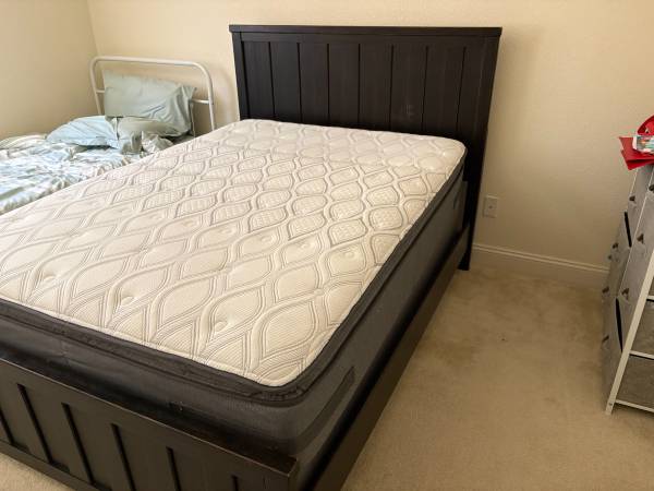 Full size bed with pristine mattress 1