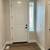 The open-concept kitchen is equipped with stainless steel appliances 16 thumbnail