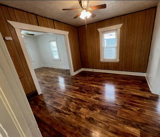 Cute 2 bed home with large living room, front porch, unfinished baseme 1