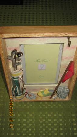 Two golf-themed picture frames 1