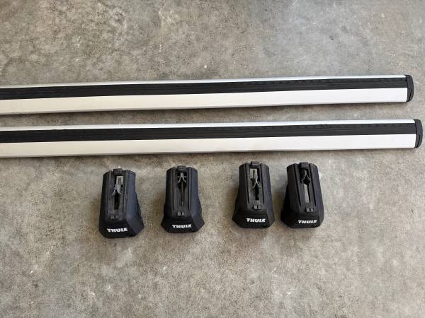 Thule Roof Rack System: WingBar Evo + Evo Raised Rail Feet 1