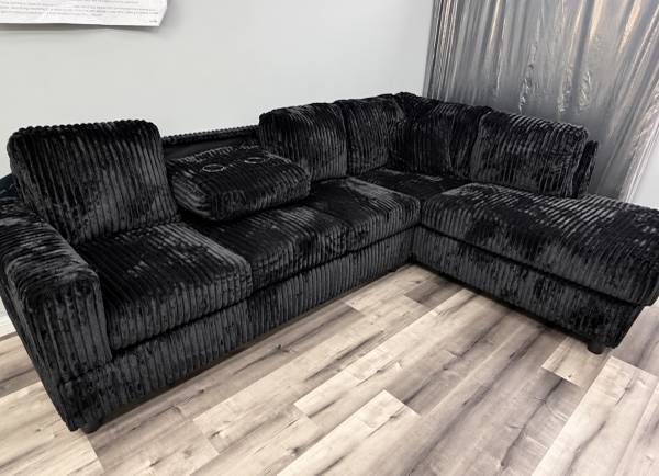 New In Box Black Fluffy Reversible Sectional with Cupholders 1