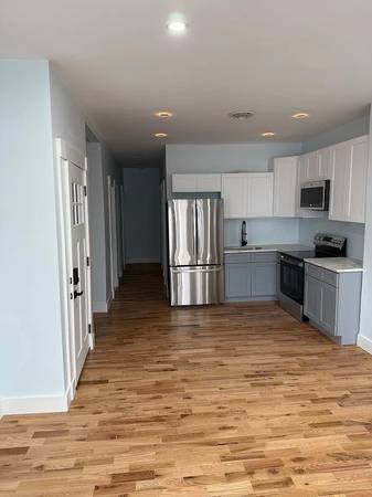 Spacious two-bedroom, two full bathroom apartment filled with natural 1