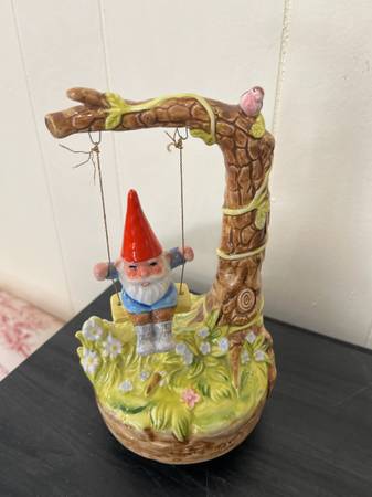 A vintage ceramic GNOME on a swing music box 1