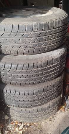 4 Ford Rims and New Tires 1