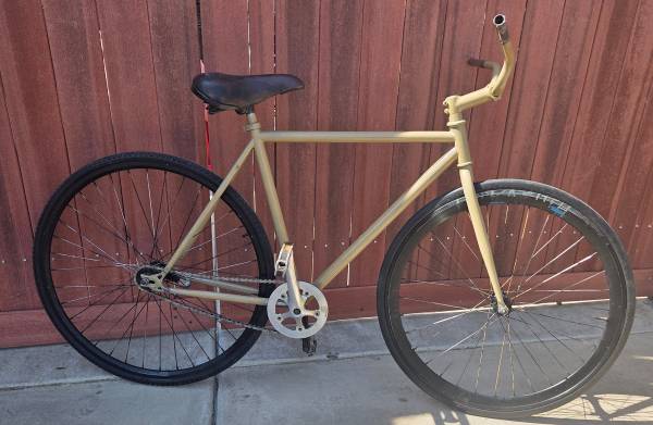 single-speed /Tan-matte frame, fixed-gear bike, $150 1