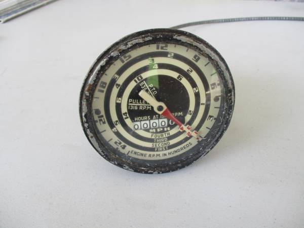 A Tractor Dash Panel Gauge Shows Mph & Rpm, On Old Ford Tractors 8N 1