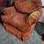 Rust colored comfy armchair 3 thumbnail
