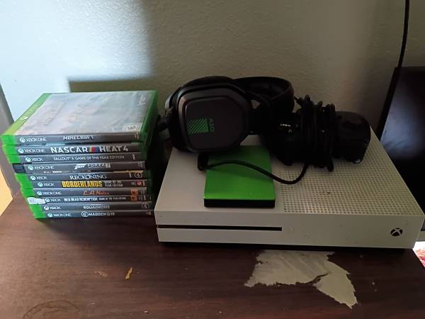 Xbox, controller, 2 terabyte hard drive, headset, and 10 games 1