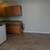 Soft hued paint accented with white paneled doors, Carports available 2 thumbnail