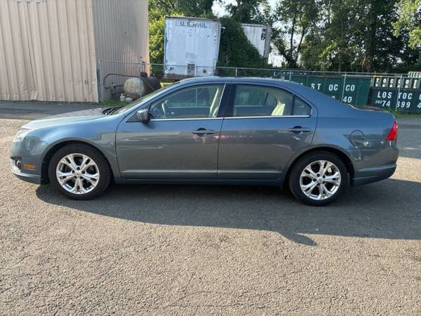 (EN OFERTA) Ford Fusion SE 2012, funciona excelente, color azul (Financiamos) - $4.500 (CARMEL NY / DANBURY LLAME AL 203 231 1817)63436938560257121