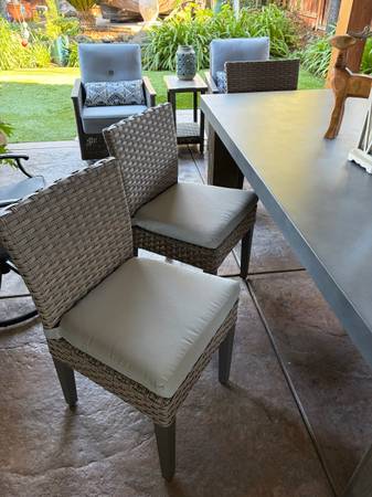 Six gray resin wicker outdoor dining chairs (2 arm and 4 side) 1