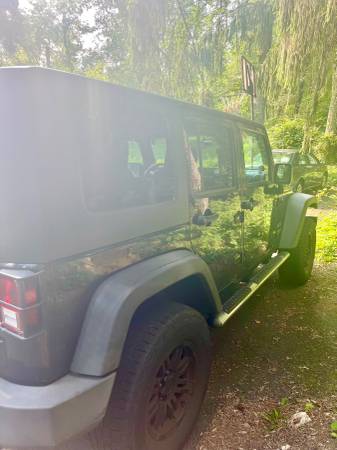 Jeep Wrangler Unlimited Sport 4D - $8,90063618565853313124