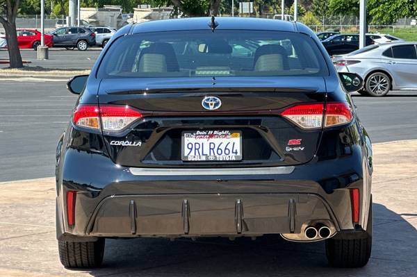 2025 Toyota Corolla Hybrid sedan Midnight Black - $27,998 (_Toyota _ _ Corolla Hybrid _)63613247359105123