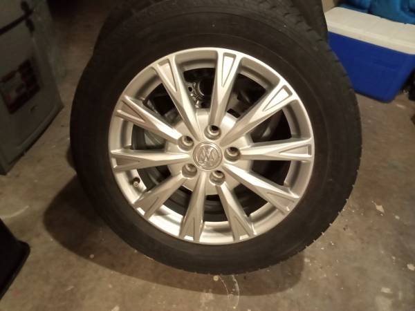 235/55/17 cadilac rims 1