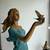 Life size lady bronze sculpture, holding a bird 2 thumbnail