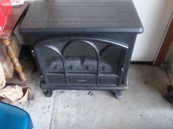 Electric Fireplace, Small in Size, Black in color 1