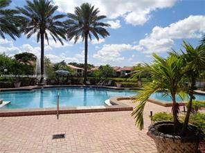 $1,450 / 1br - NICE GATED . LUSHLY LANDSCAPED CONDO COMMUNITY (POMPANO BEACH)64049277713922121