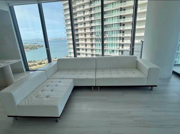 Modani white leather couch like new 1
