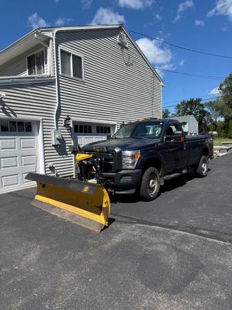 Ford F250 w/ Fisher SnowPlow 1