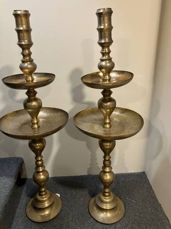 Large brass floor candle holders. 1