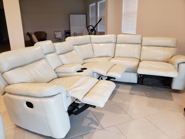 Leather sofa sectional with 3 recliners. 1