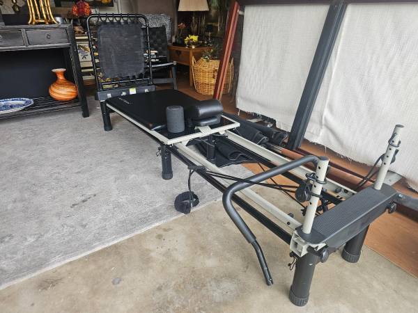 AeroPilates machine with trampoline attachment 1