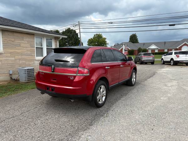 2010 Lincoln MKX AWD-asientos de cuero calefaccionados y refrigerados-Sistema Microsoft SYNC-Techo solar - $7,00063654695881603124
